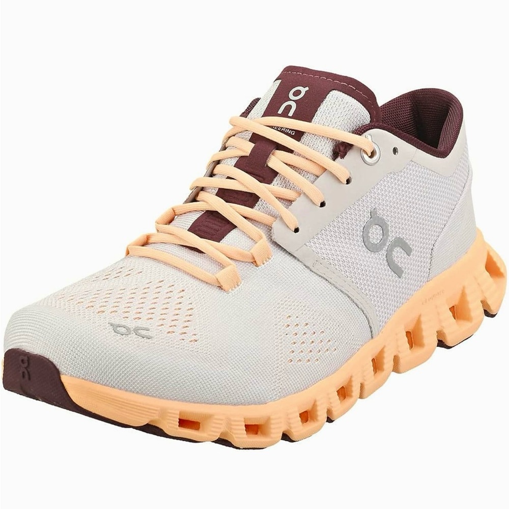 On Running Cloudflow Shoes in Cream and Peach